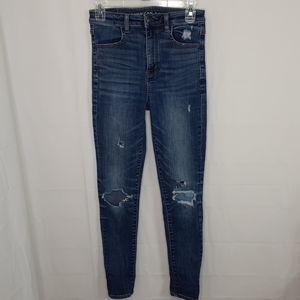 American‎ Eagle Highest Rise Jegging Jeans Size 4 Blue Distressed Super Stretch